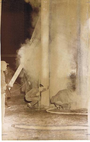 DCFD Firefighters tackle a house fire on Cove Rd. Nov. 25, 1964. Courtesy of The Westery Sun